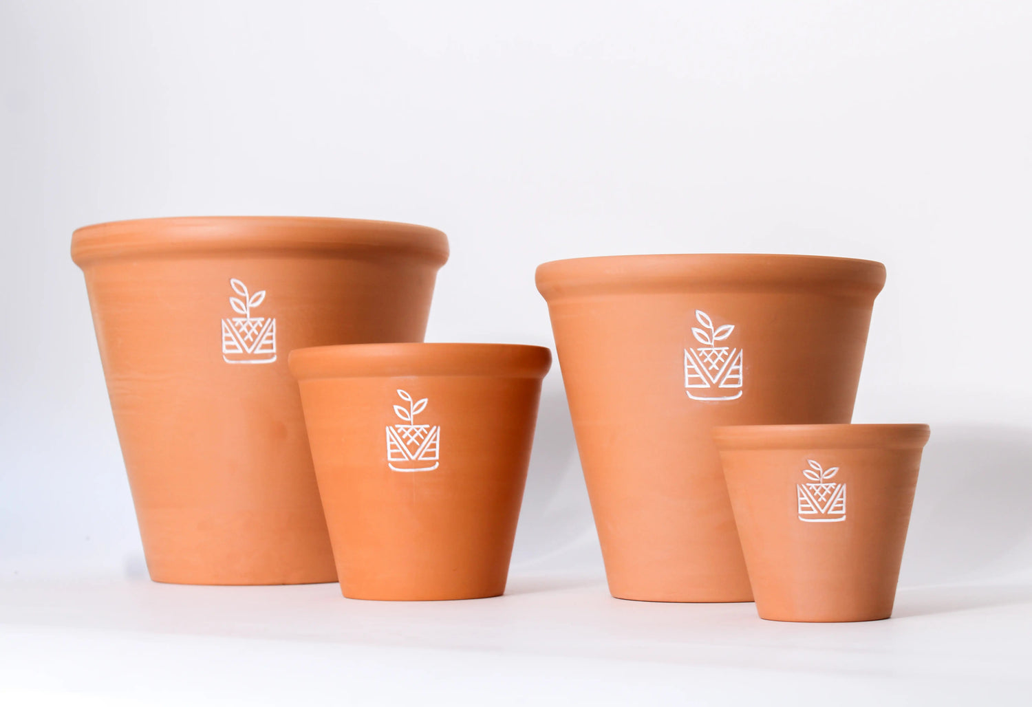 terra-cotta pots in all various sizes for live plants